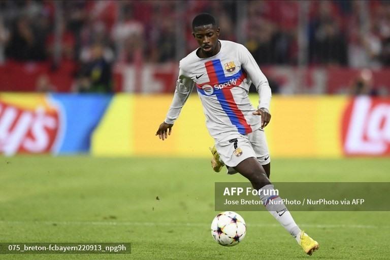 Dembele tạo ra nhiều đột biến trong hiệp 1.  Ảnh: AFP