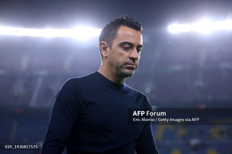 Xavi hoàn toàn bất lực.  Ảnh: AFP