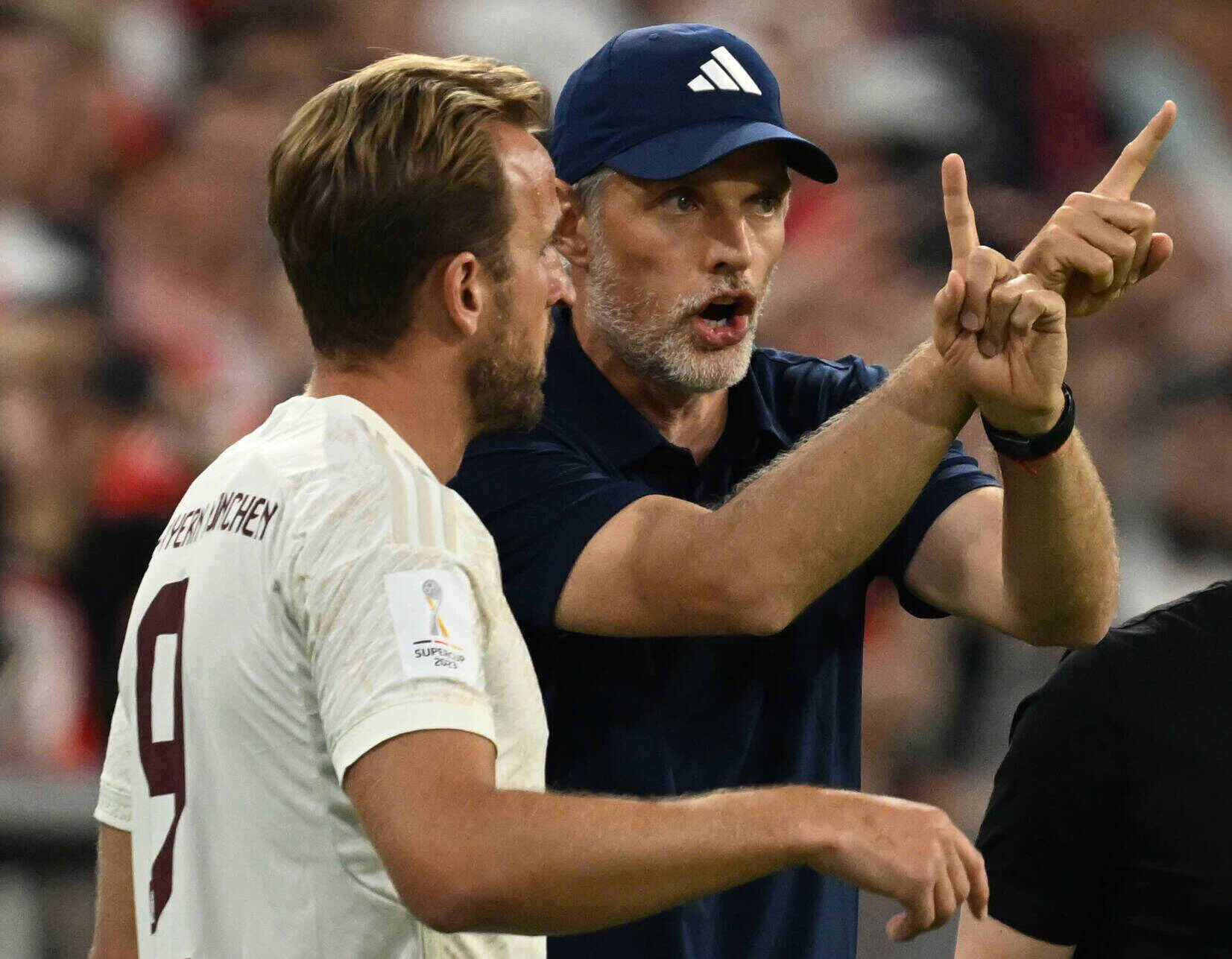 Harry Kane và Tuchel khi còn ở Bayern Munich. Ảnh: AFP